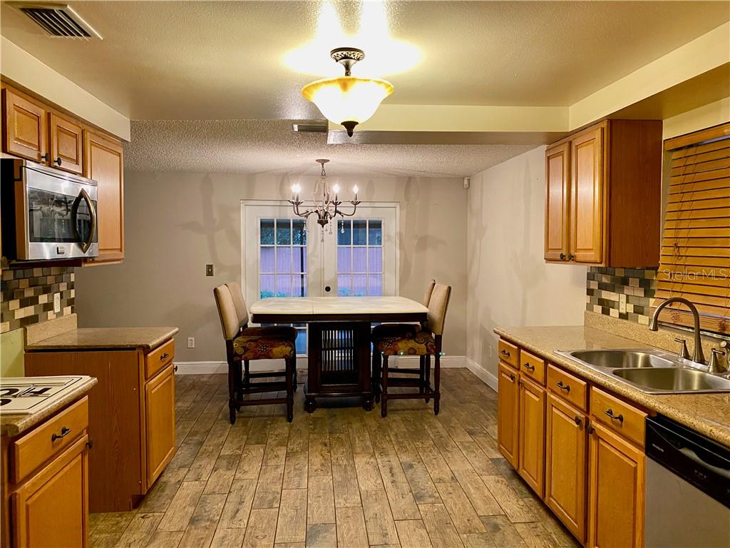 2718 MIDTIMES DR — photo 3