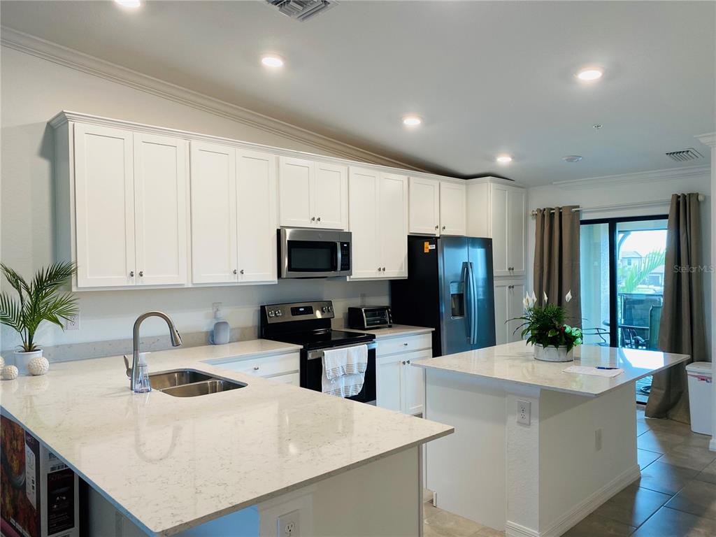 5664 PALMER CIR #202 — photo 10