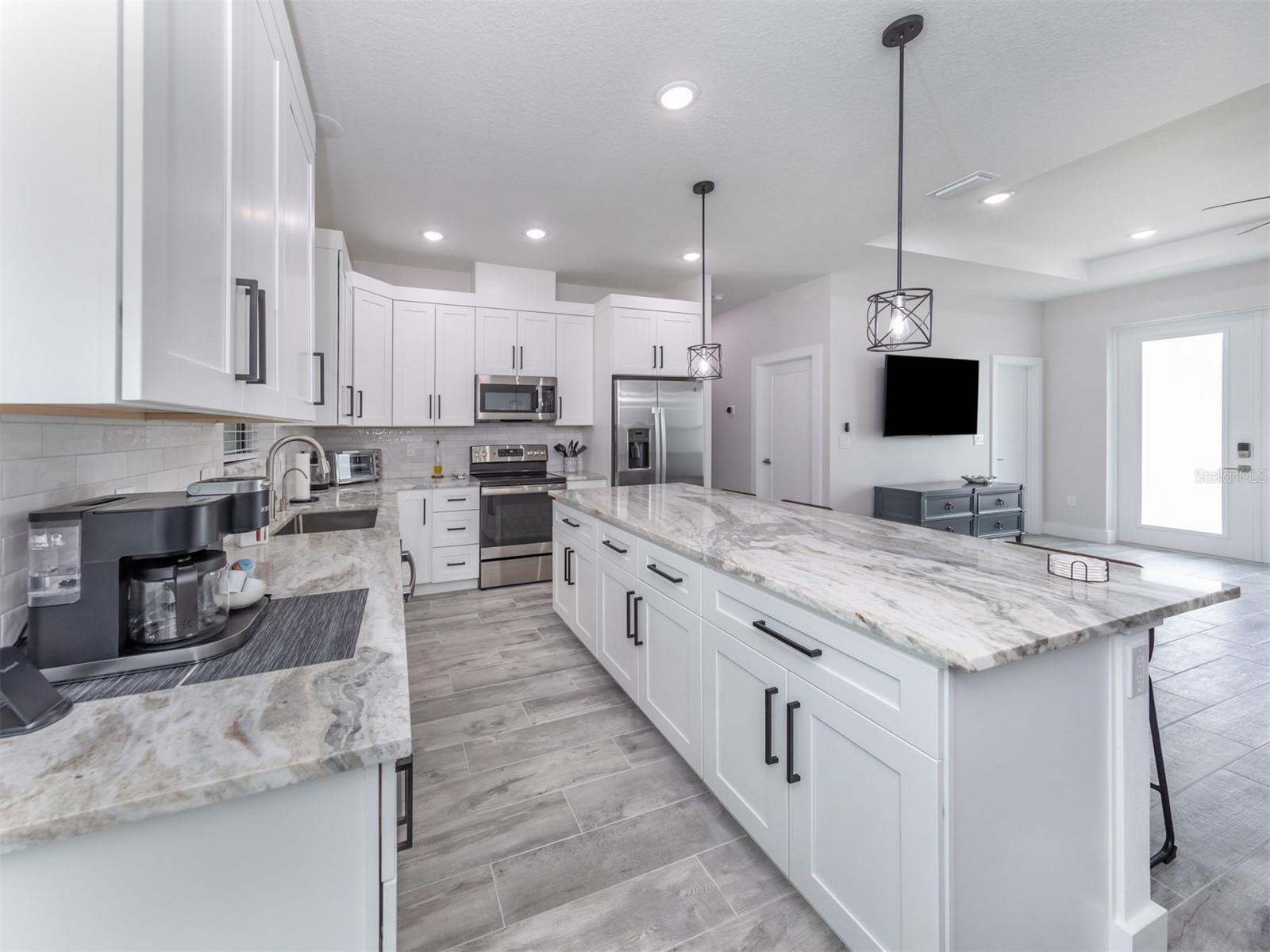 17566 DE MIRANDA AVE — photo 12