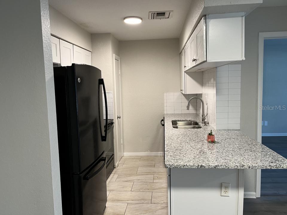 624 GOLDEN RAINTREE PL #624 — photo 14