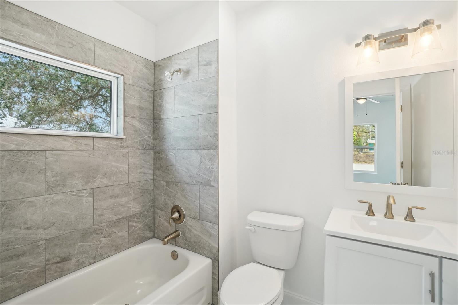 7409 & 7411 E 23RD AVE — photo 21