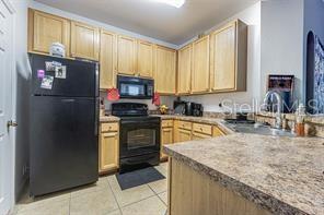 10205 COURTNEY PALMS BLVD #304 — photo 5