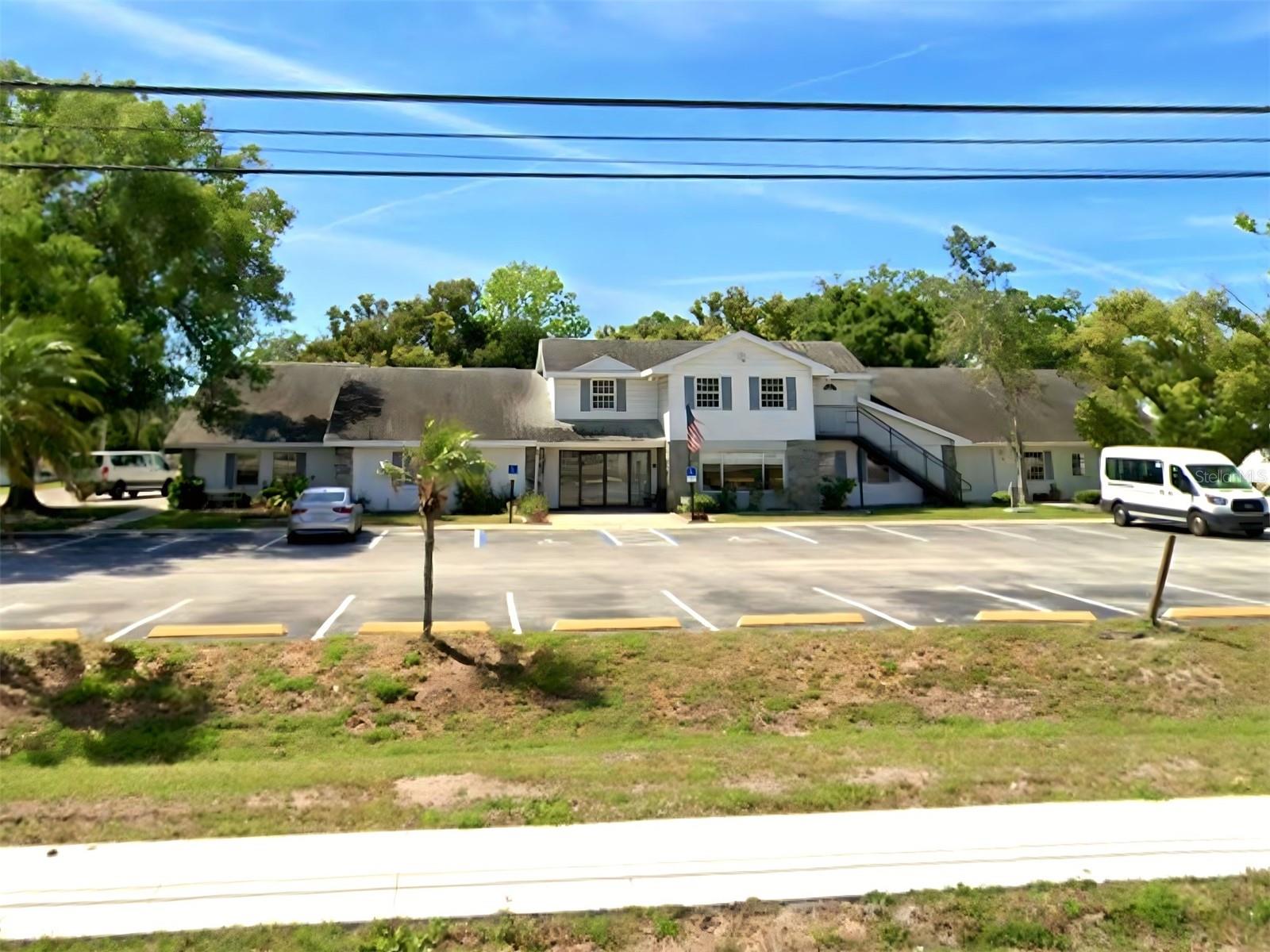 8726 OLD COUNTY ROAD 54 — photo 2