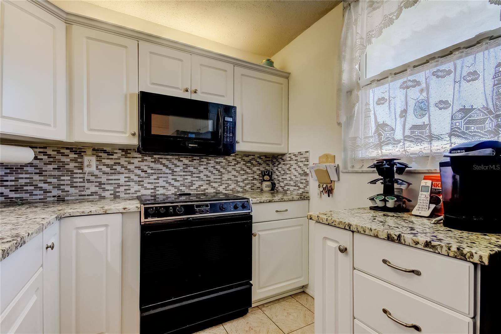 7465 BAY ISLAND DR S #213 — photo 12