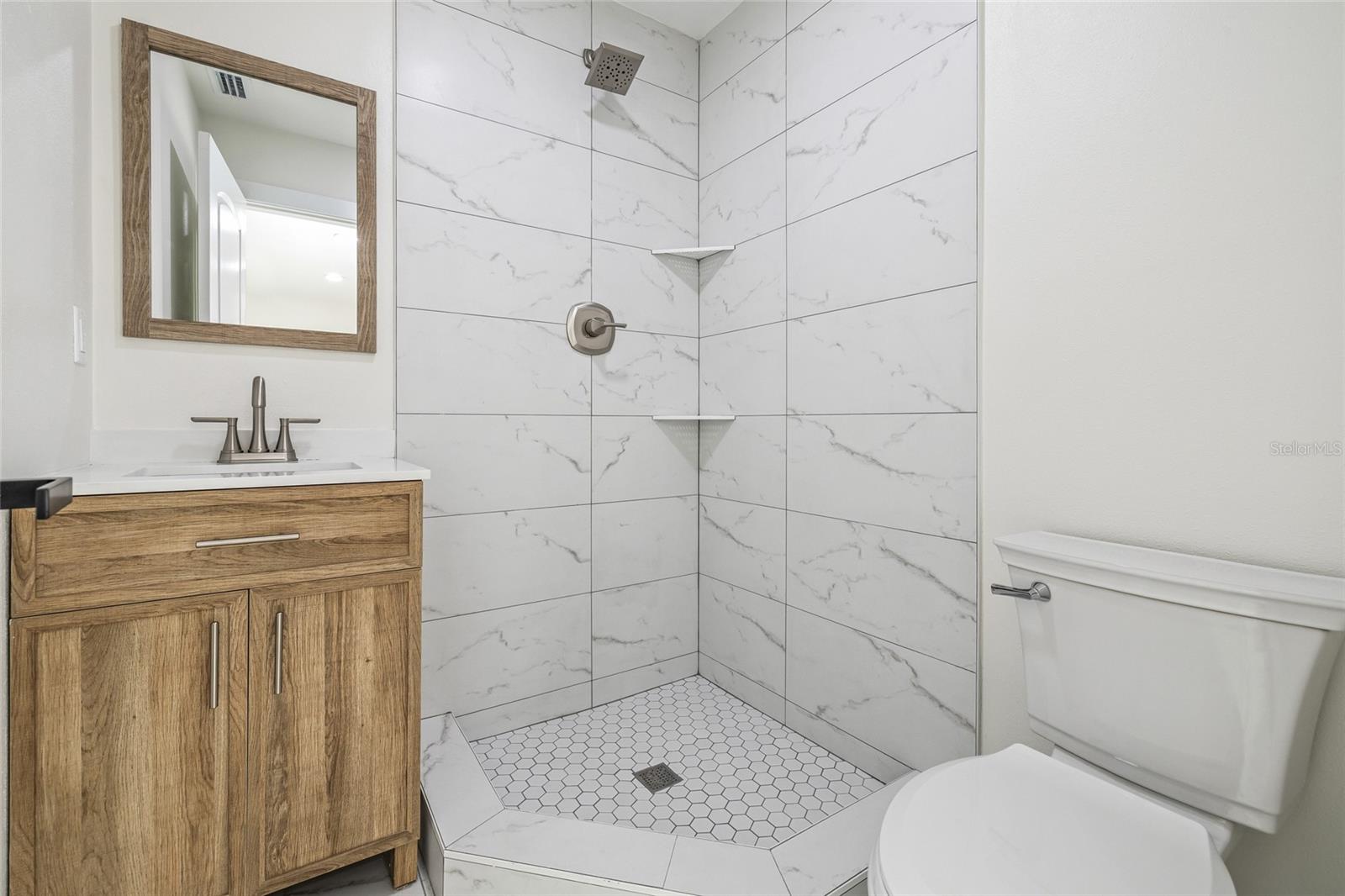 7311 N ARMENIA AVE — photo 22