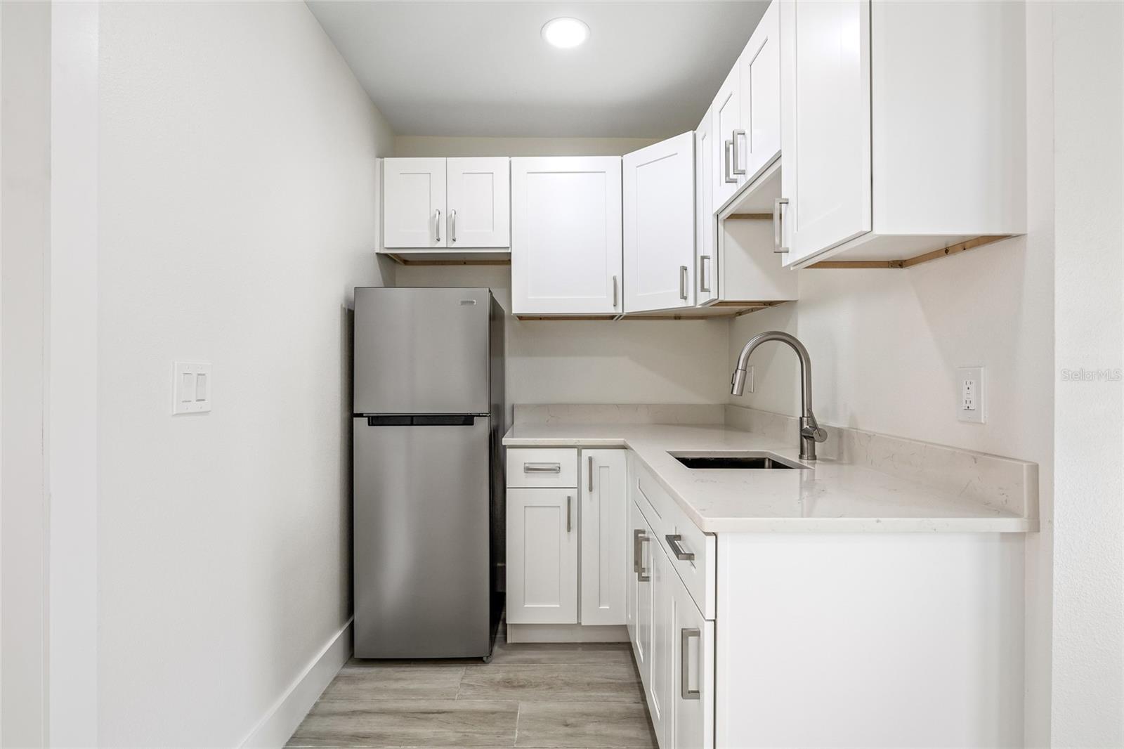 7311 N ARMENIA AVE — photo 20