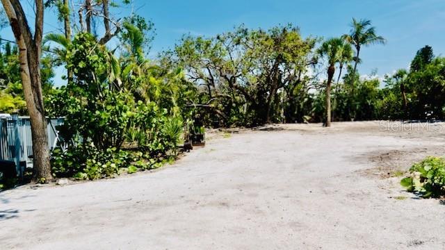 7233 MIDNIGHT PASS RD — photo 5