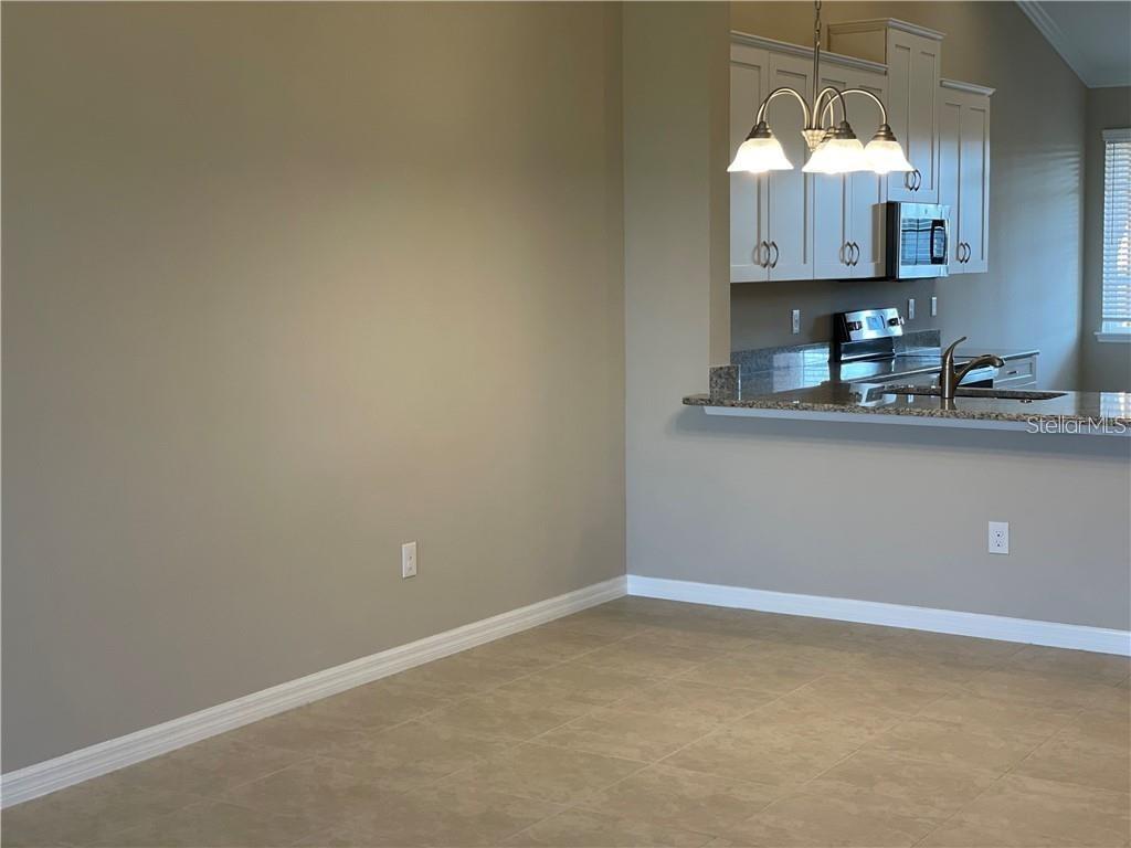 13823 MESSINA LOOP #203 — photo 3