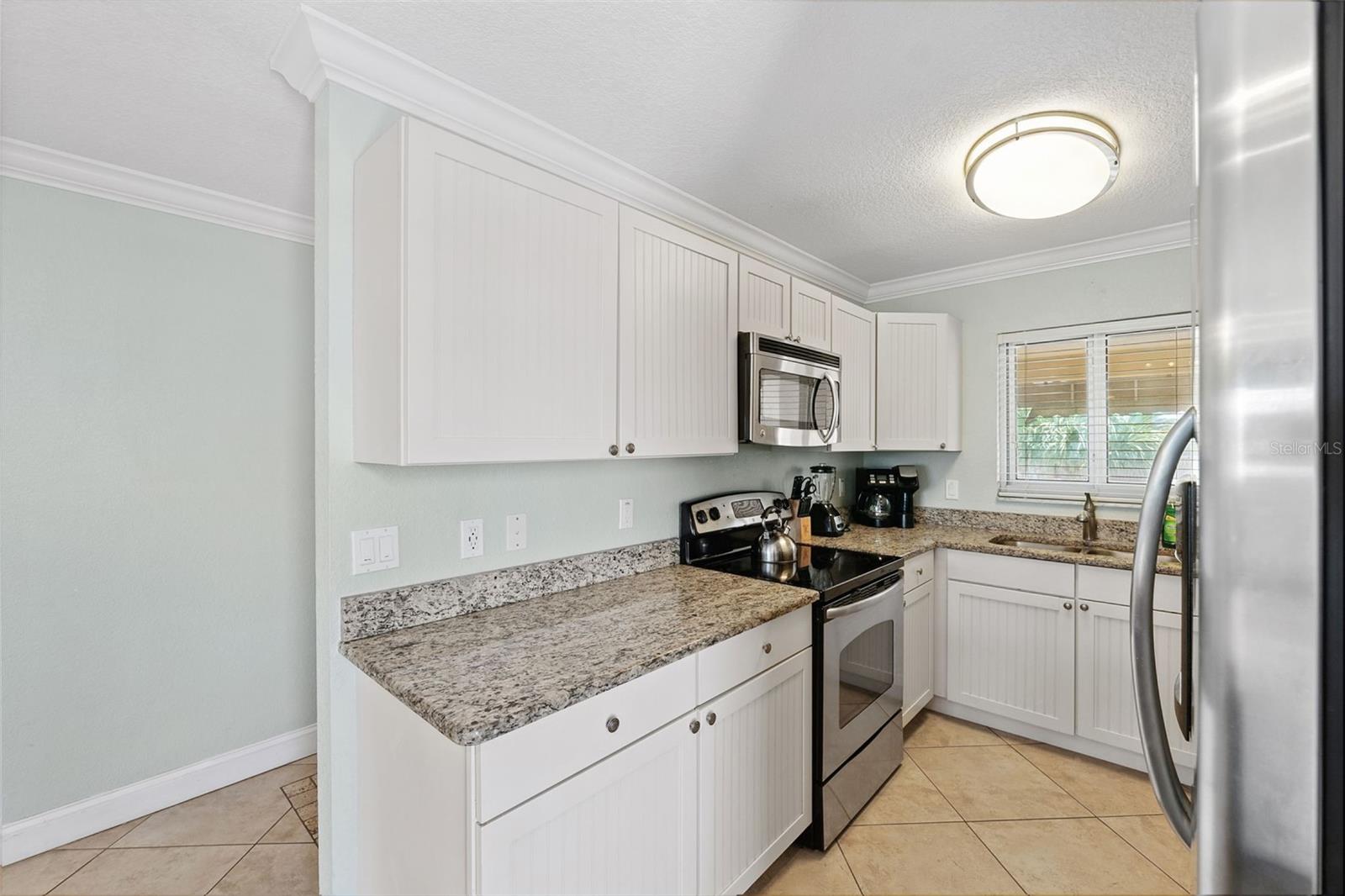 10265 GULF BLVD #A-301 — photo 11