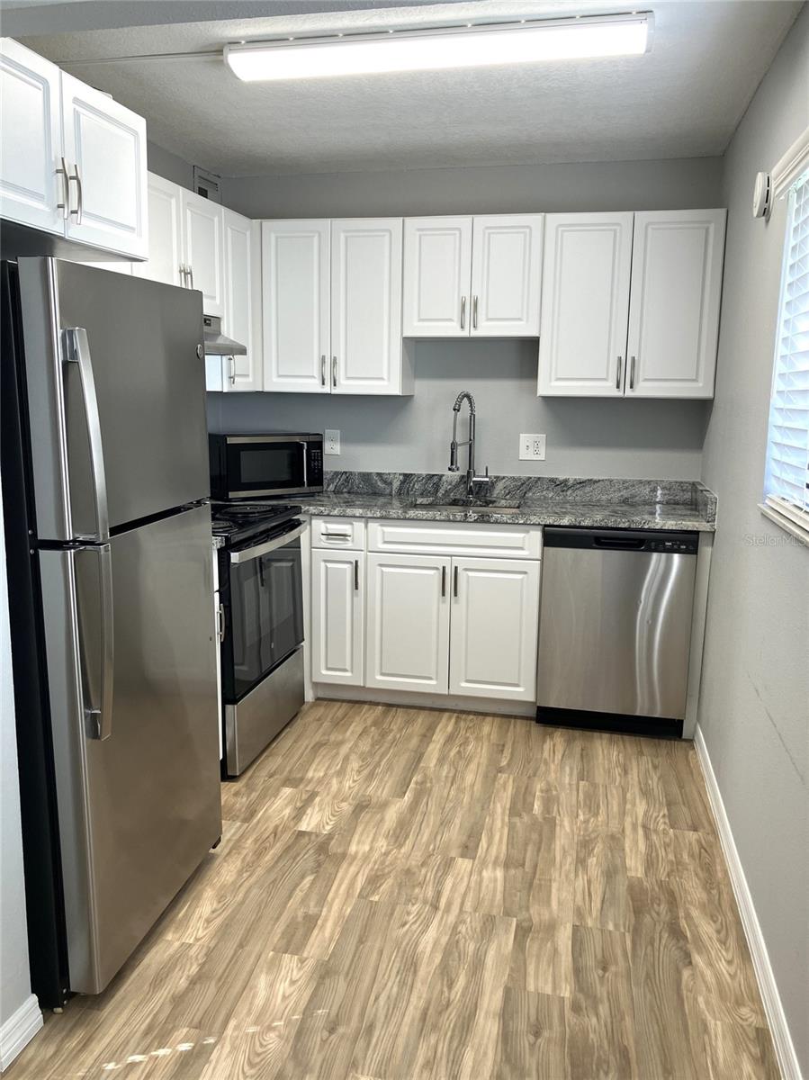 11703 RAINTREE VILLAGE BLVD #B — photo 25