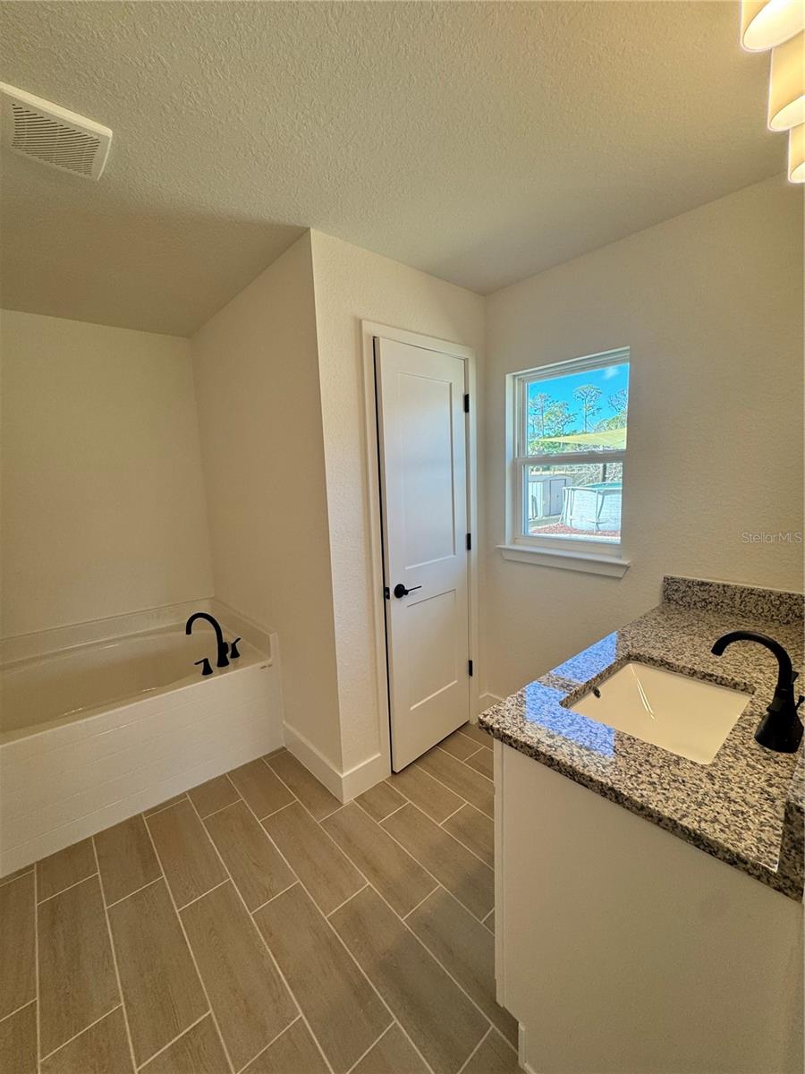 7933 TROPICAIRE BLVD. — photo 9