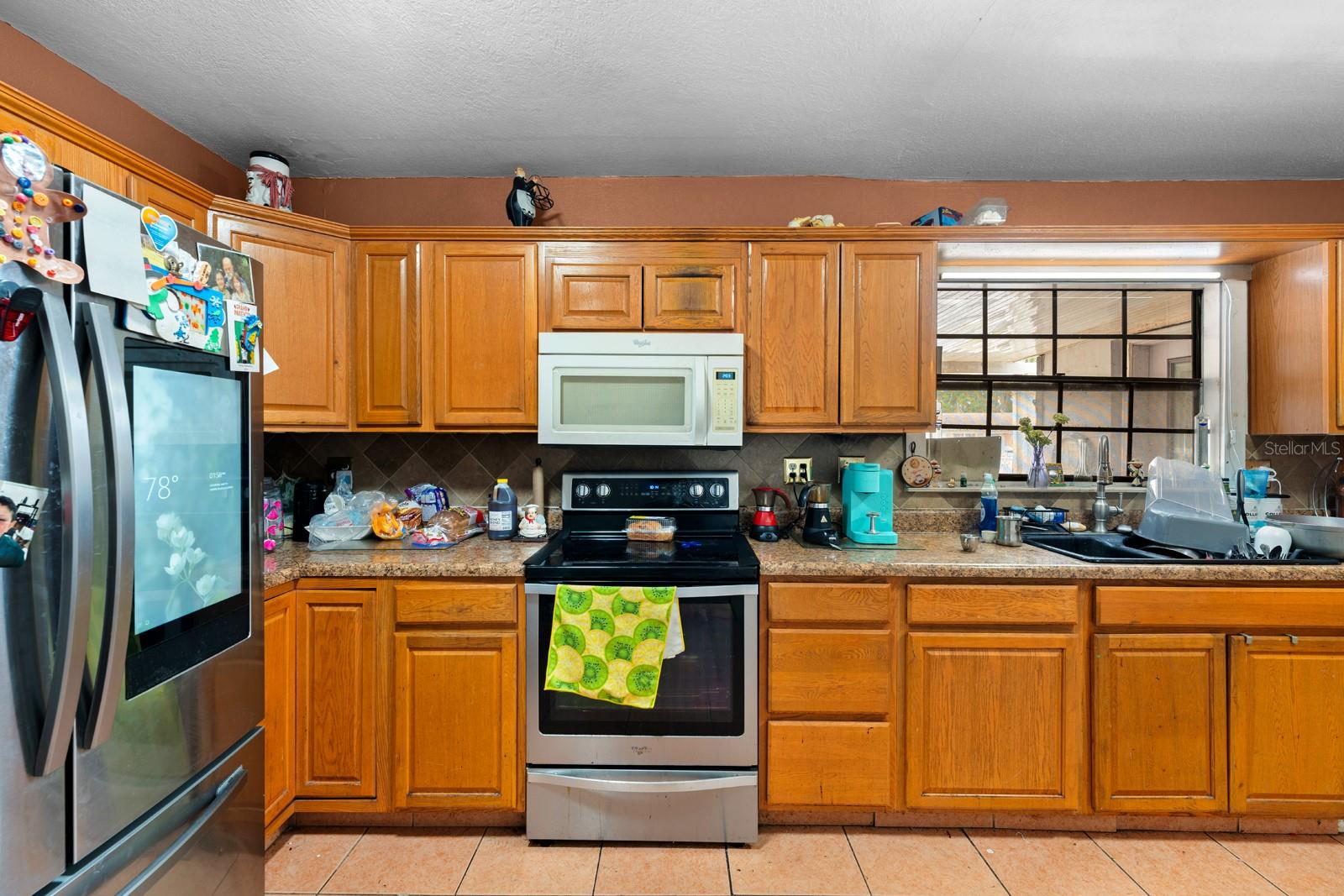 6807 N HIMES AVE — photo 8