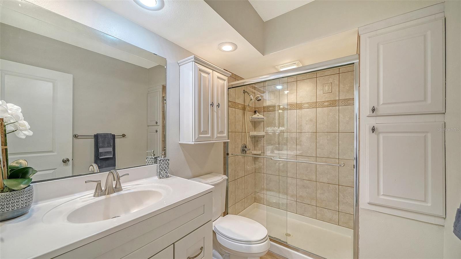 101 WHISPERING SANDS DR #107 — photo 32