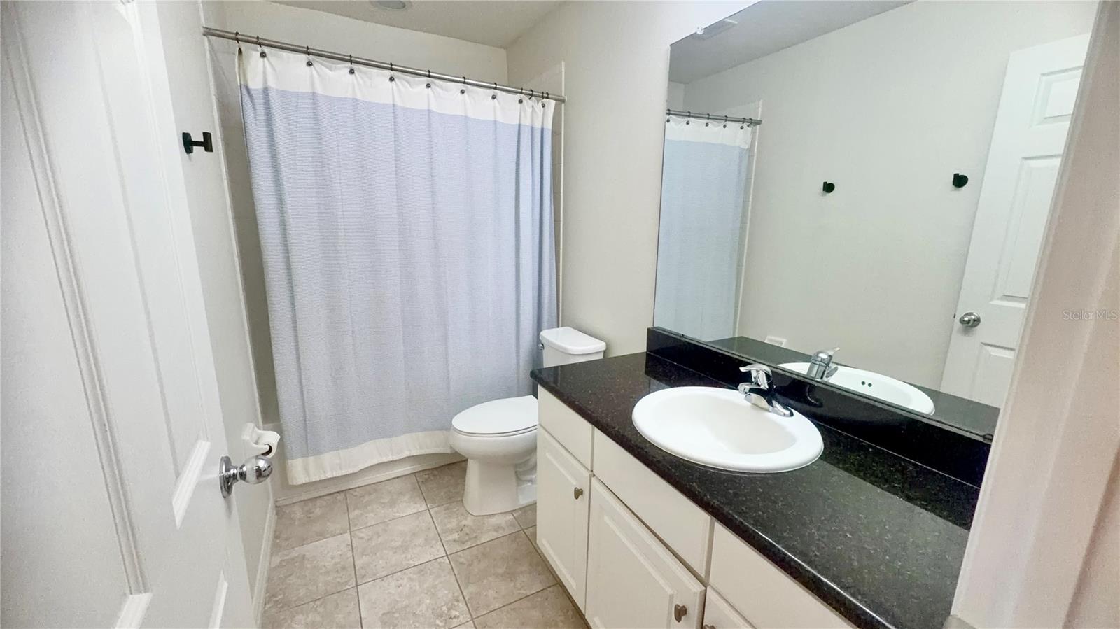 7037 WOODCHASE GLEN DR — photo 25