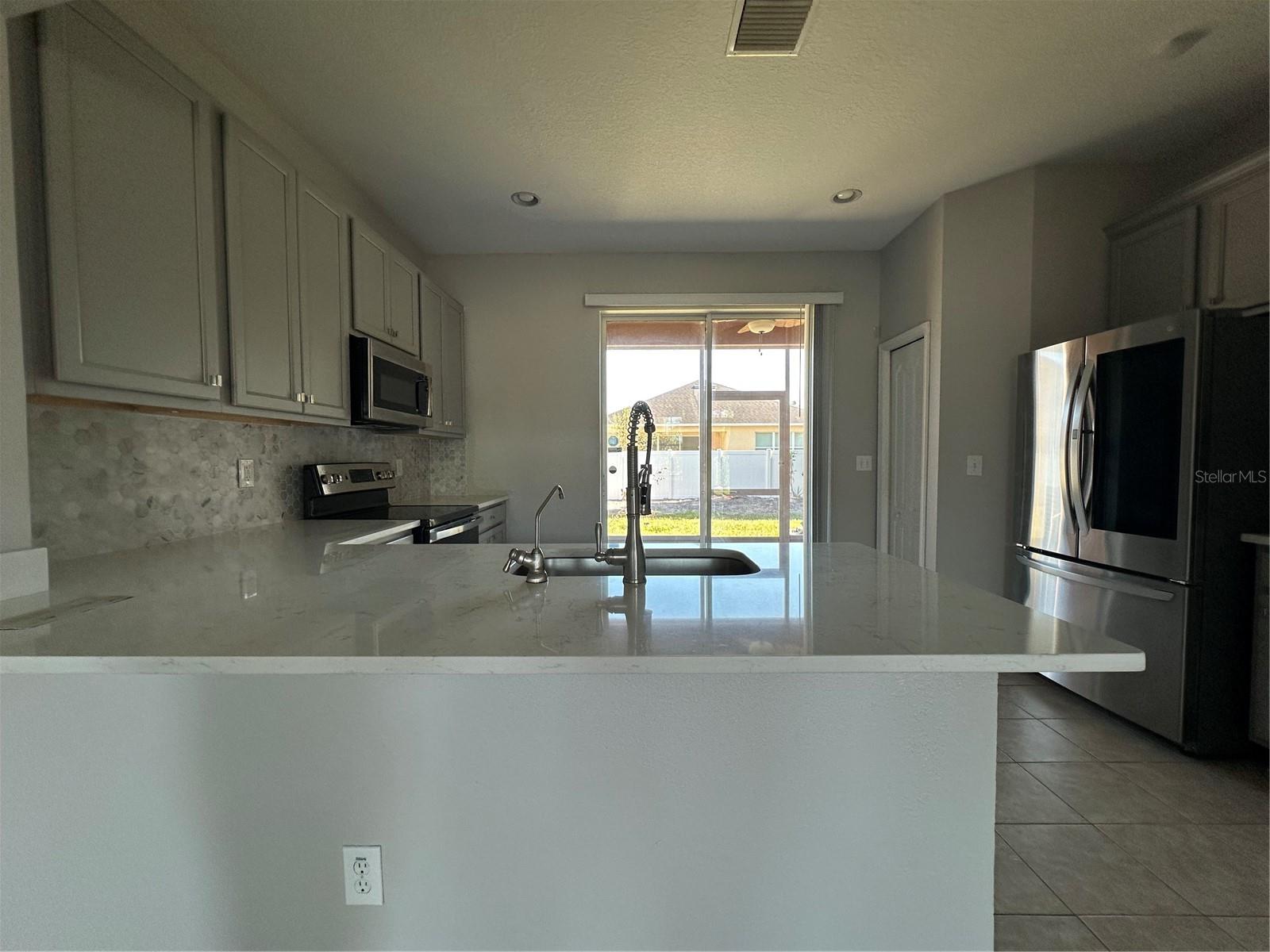 6950 TOWERING SPRUCE DR — photo 5