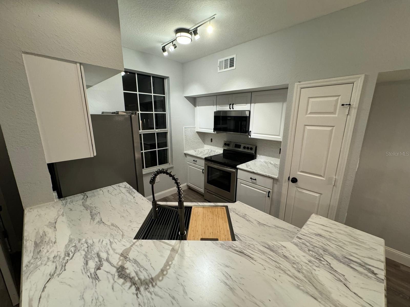 9820 LAKE CHASE ISLAND WAY #9820 — photo 12