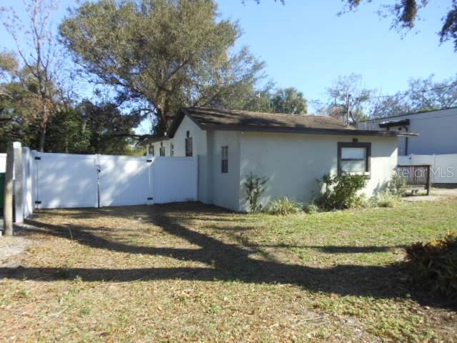 8421 N ORANGEVIEW AVE — photo 4