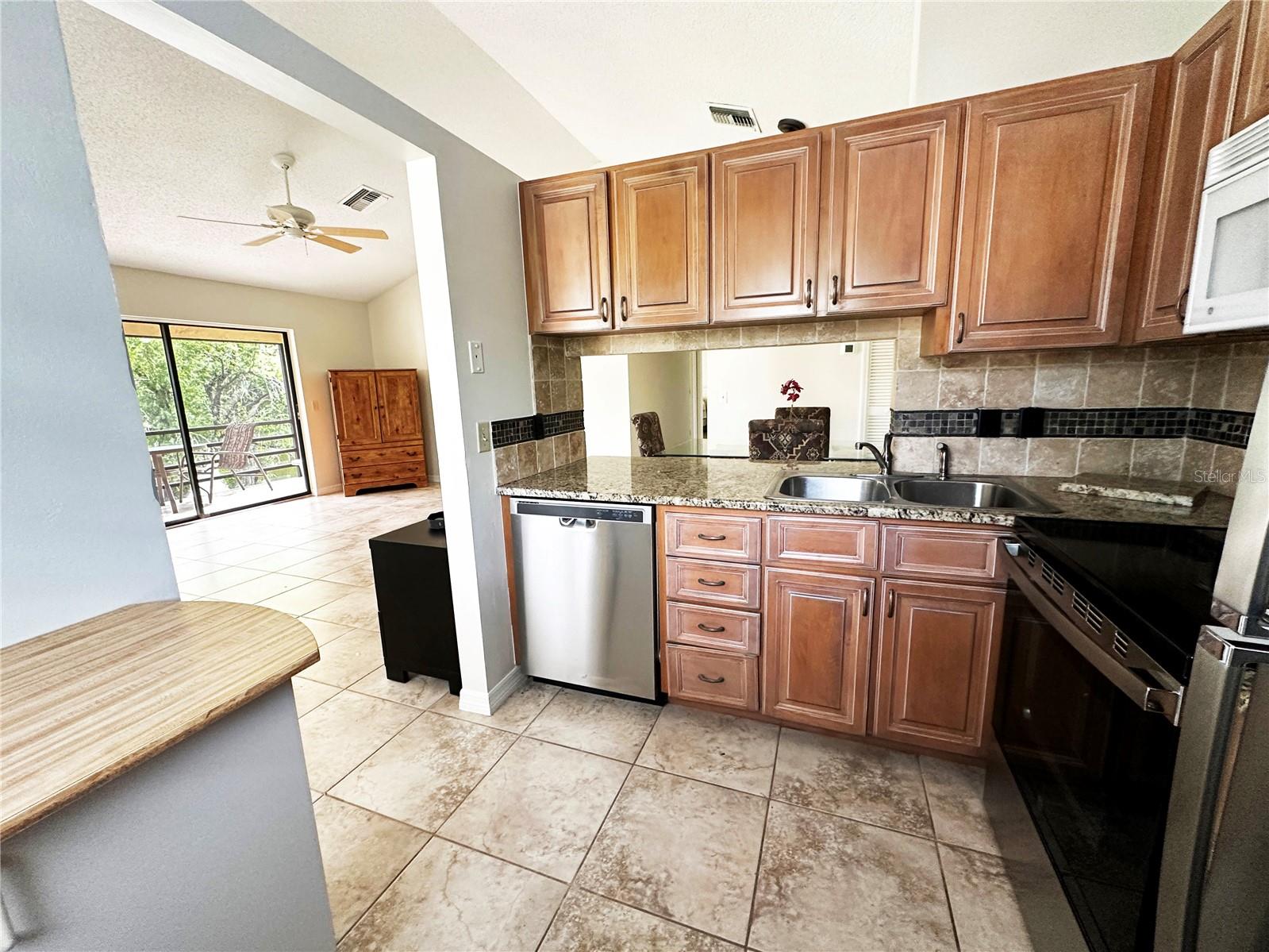 5654 GARDENS DR — photo 9