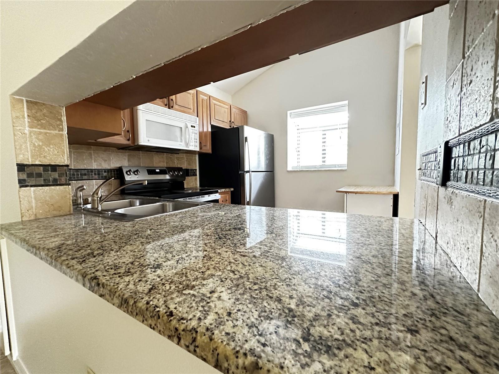 5654 GARDENS DR — photo 26