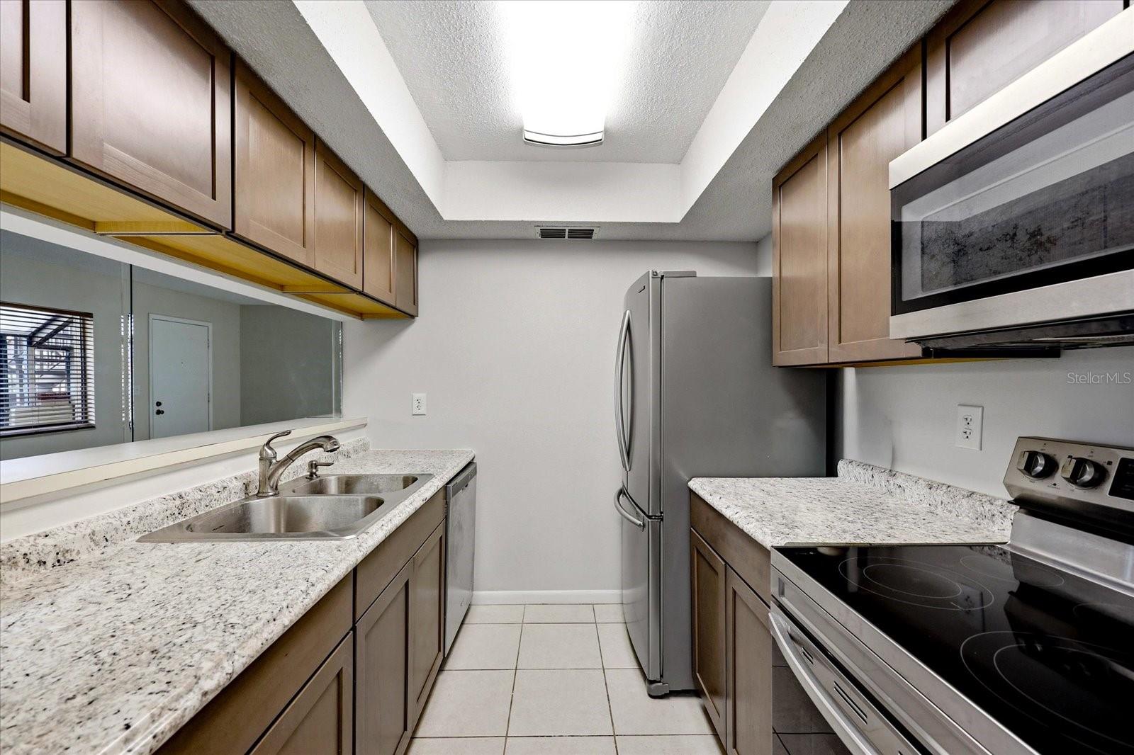 2420 WINDING CREEK BLVD #105 — photo 4