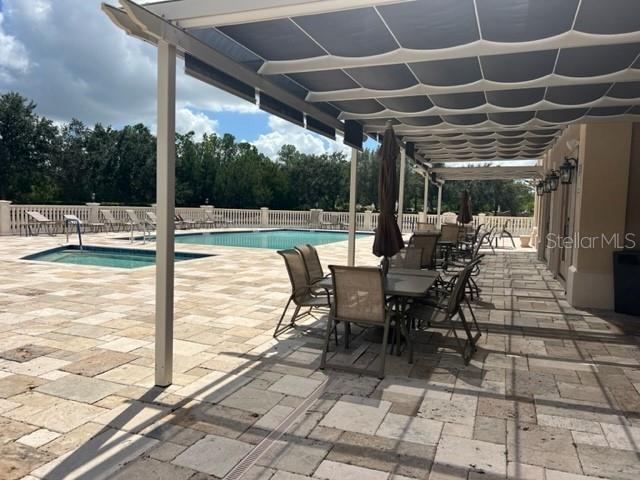 7710 LAKE VISTA CT #303 — photo 30