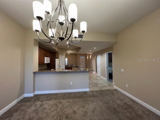 7710 LAKE VISTA CT #303 — photo 14