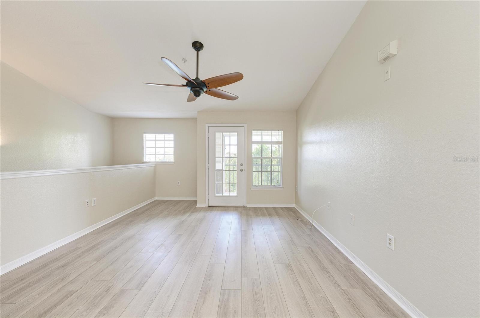 8911 MANOR LOOP #207 — photo 11