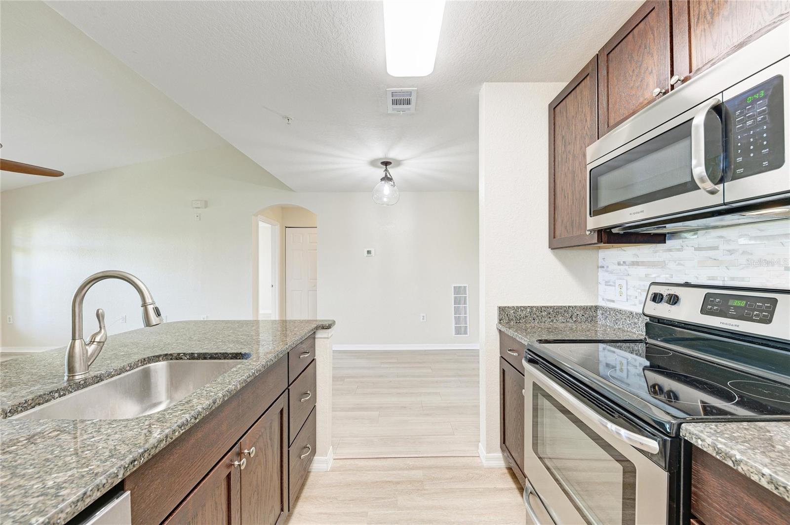 8911 MANOR LOOP #207 — photo 31
