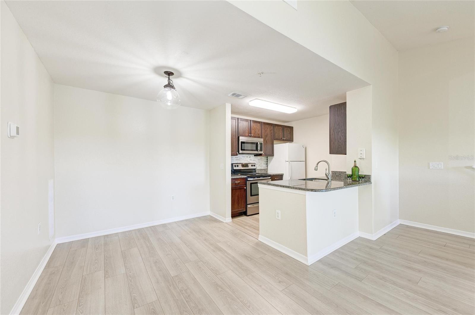 8911 MANOR LOOP #207 — photo 23