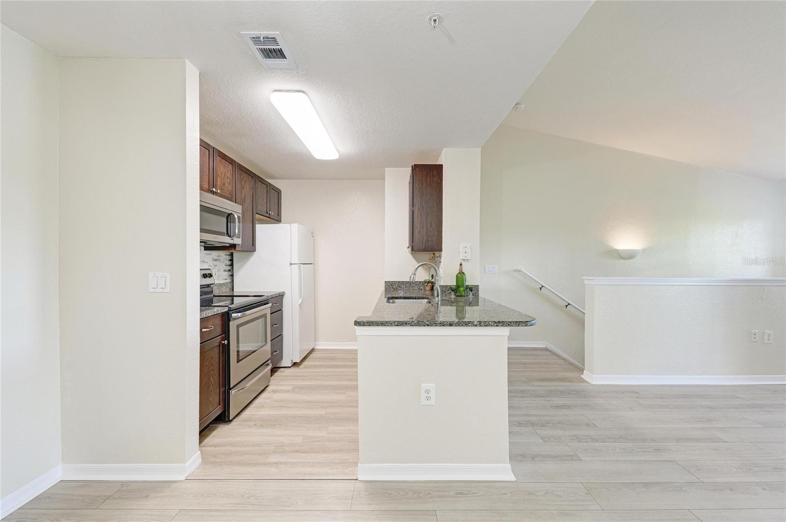 8911 MANOR LOOP #207 — photo 27