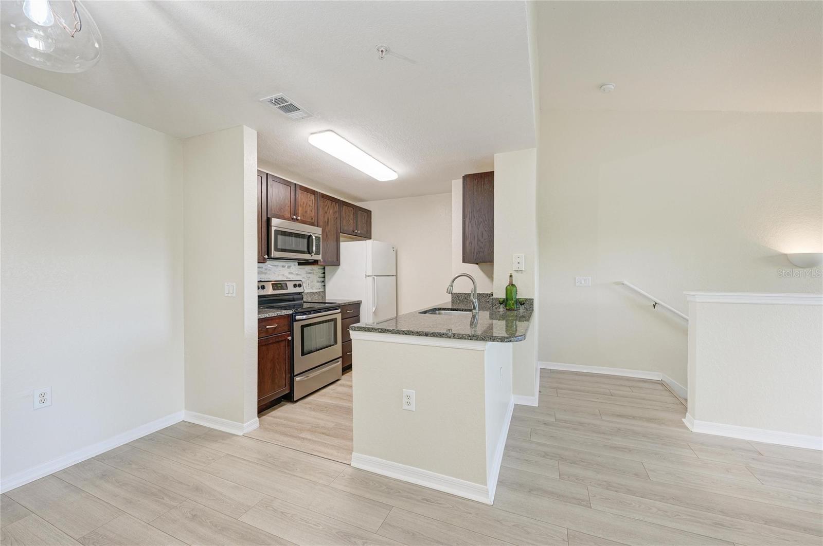 8911 MANOR LOOP #207 — photo 26
