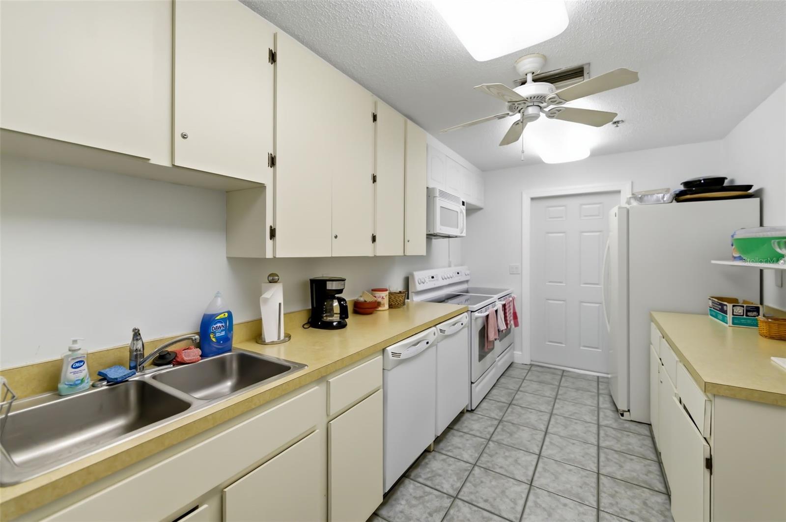 5023 VILLAGE GARDENS DR #29 — photo 42