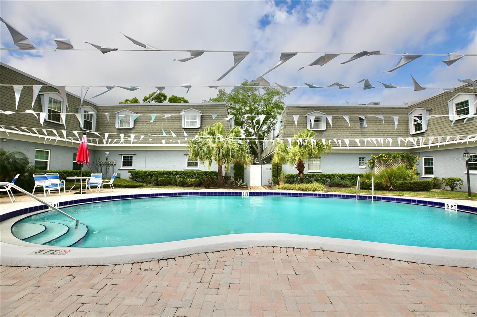 1713 BELLEAIR FOREST DR #C — photo 2