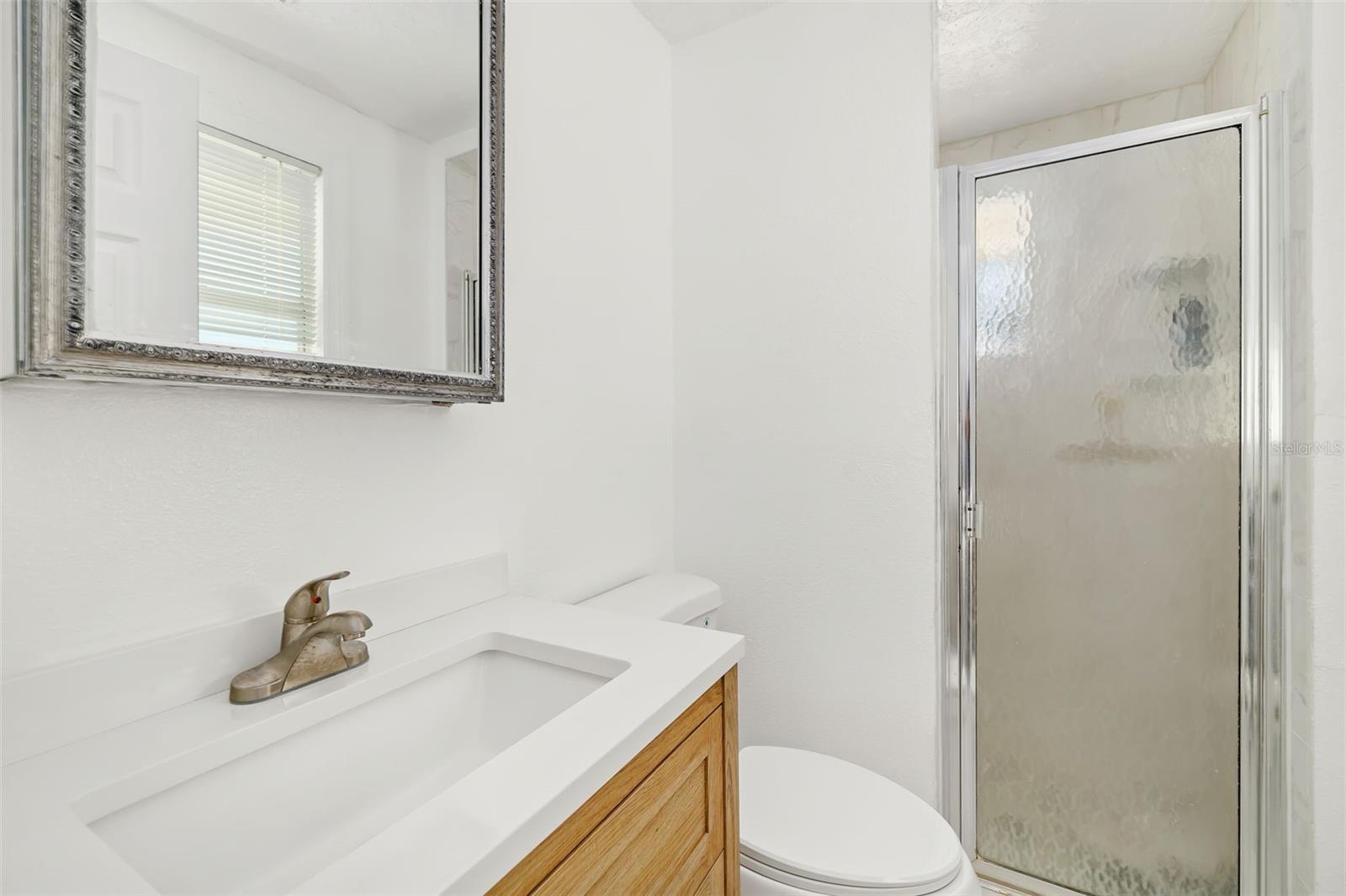 9022 MIDNIGHT PASS RD — photo 55
