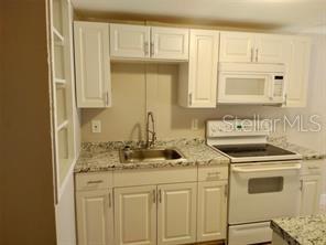 4204 N MANHATTAN AVE — photo 2