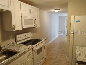 4204 N MANHATTAN AVE — photo 3