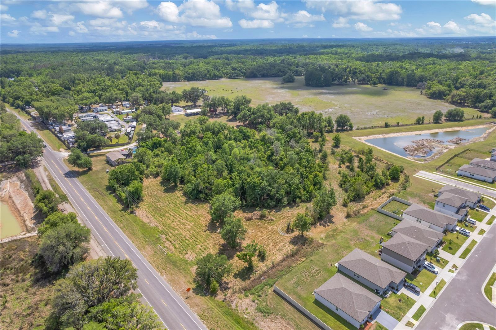 CORNER OF PAUL S BUCHMAN HWY & FORREST PLUM CT — photo 2
