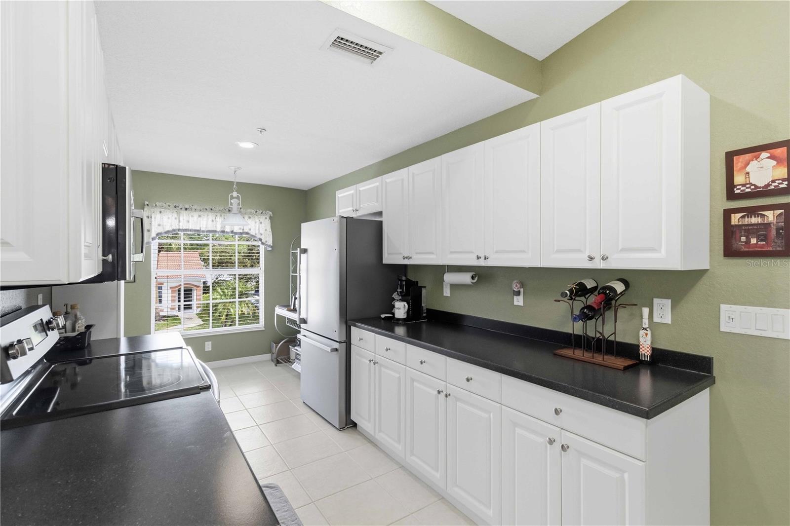 7532 MARSH ORCHID CIR #201 — photo 16