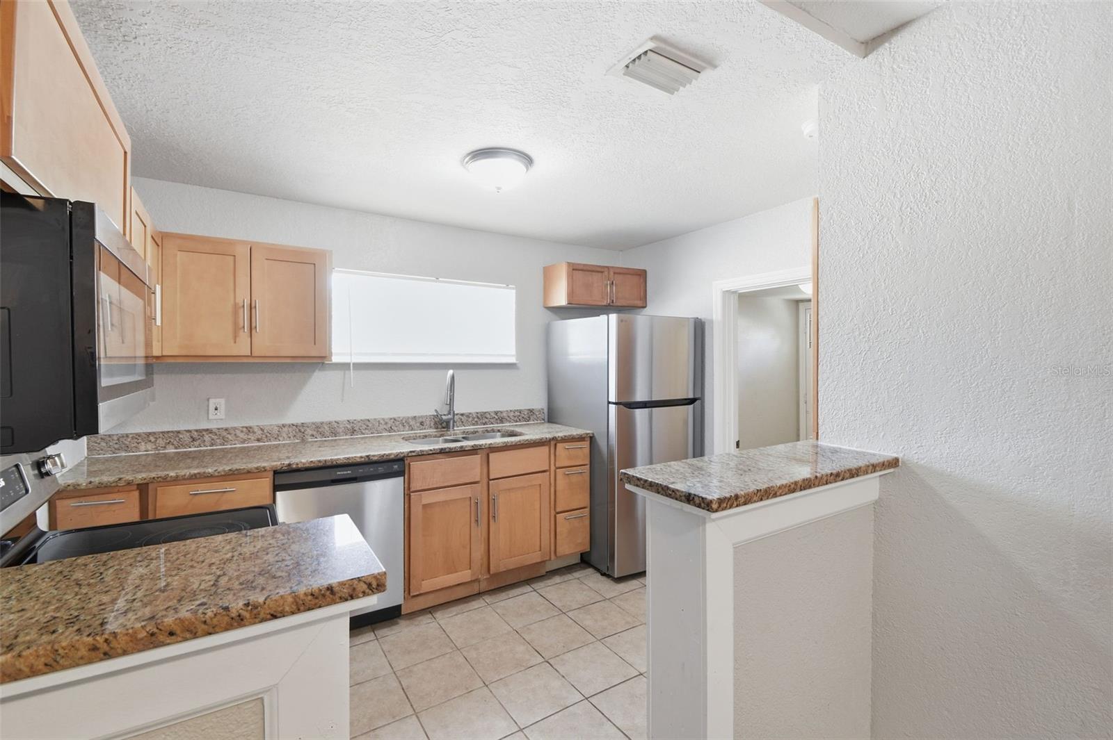 1410 E WATERS AVE — photo 12
