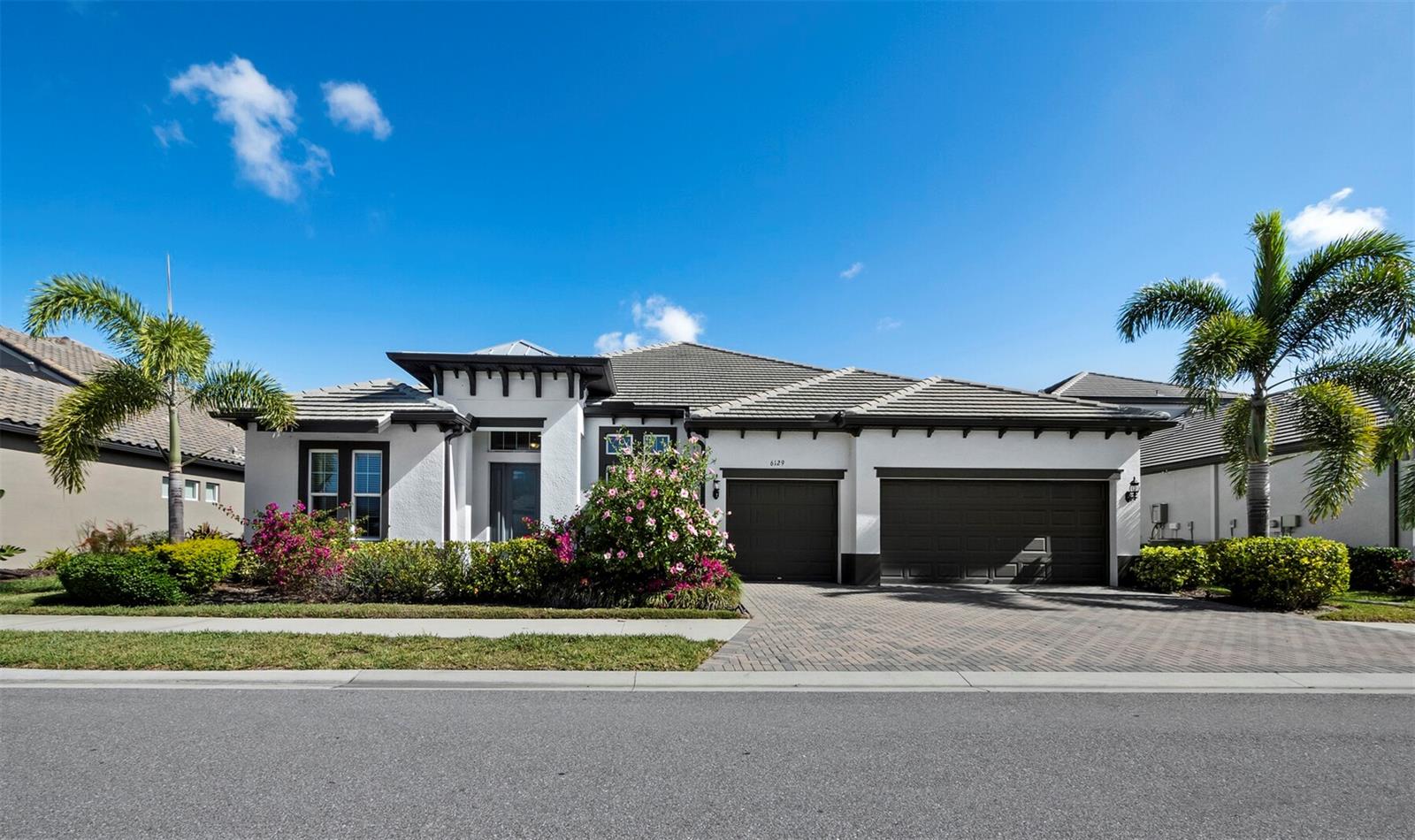 6129 LUNGO LAGO DR — photo 2