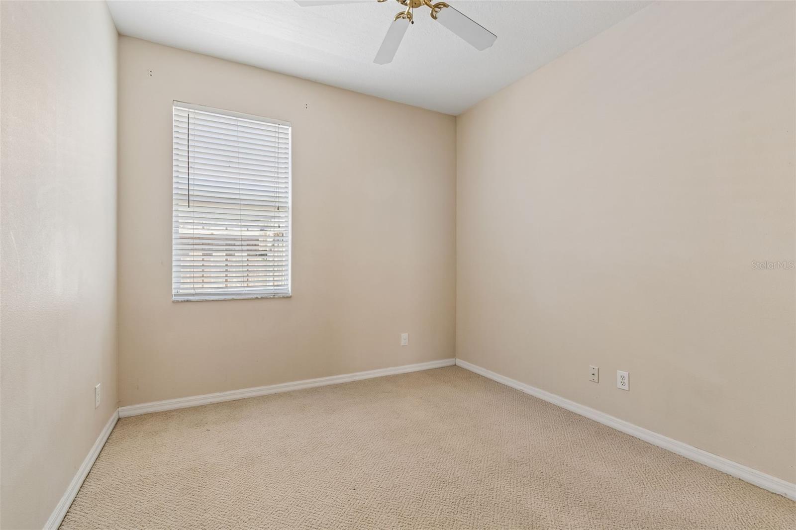 4789 WHISPERING WIND AVE — photo 33