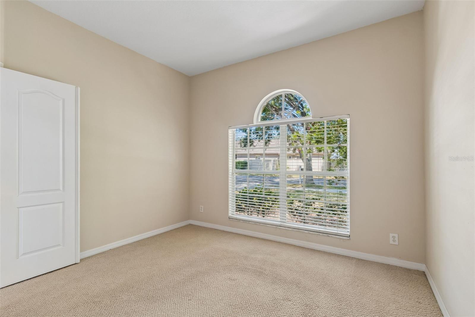 4789 WHISPERING WIND AVE — photo 17