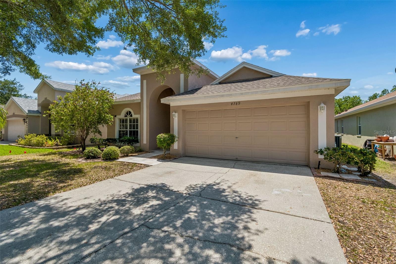 4789 WHISPERING WIND AVE — photo 7