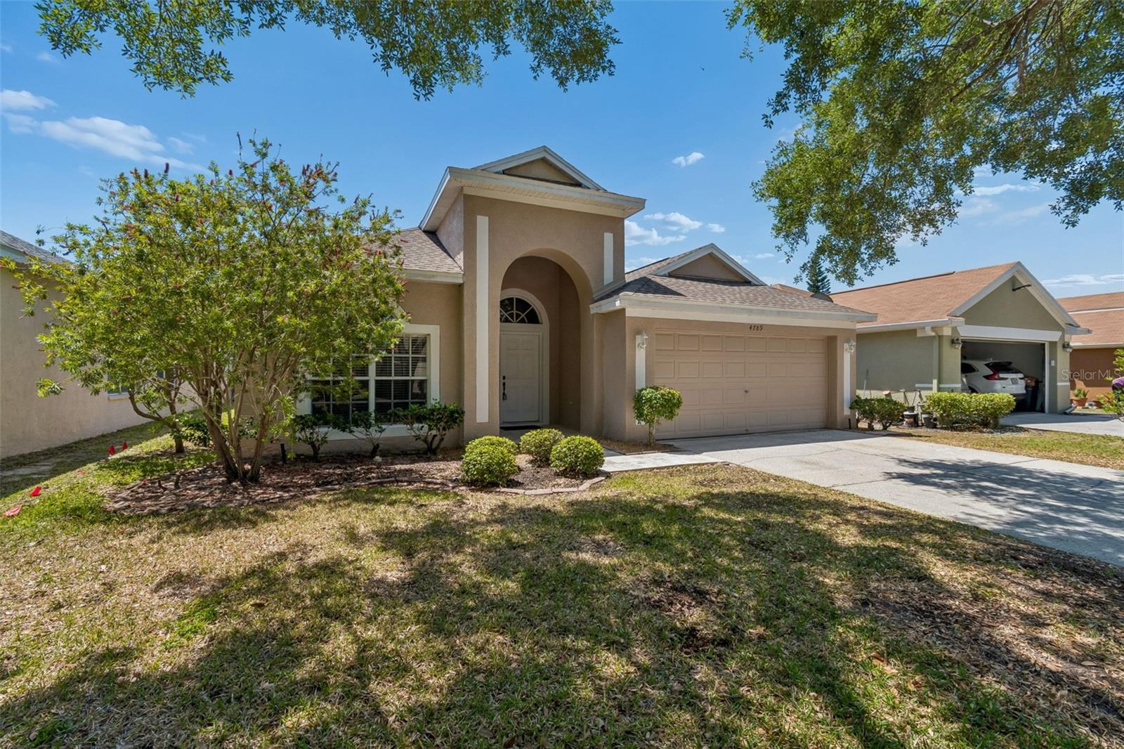4789 WHISPERING WIND AVE — photo 4