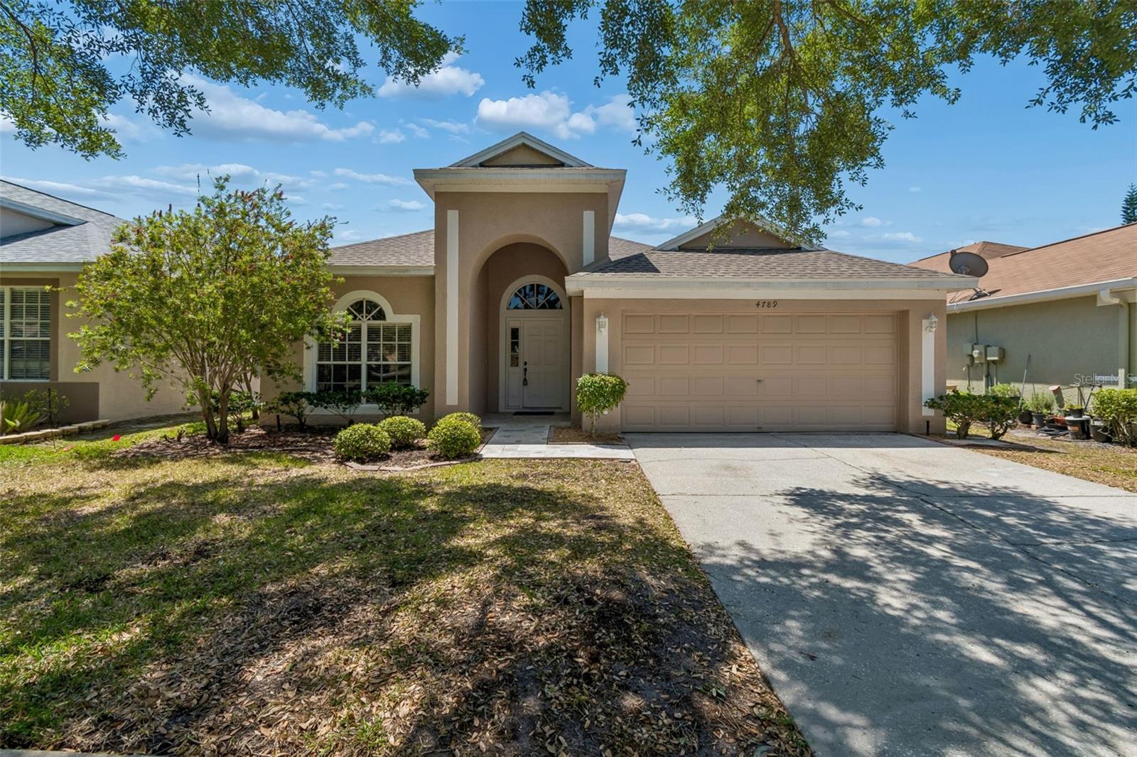 4789 WHISPERING WIND AVE — photo 2