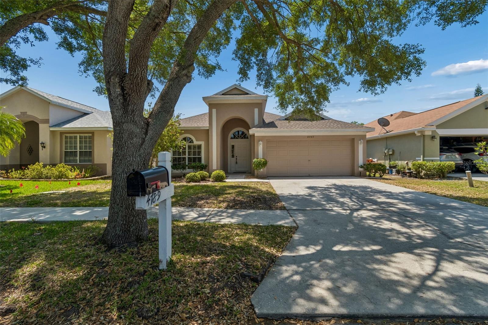 4789 WHISPERING WIND AVE — photo 5