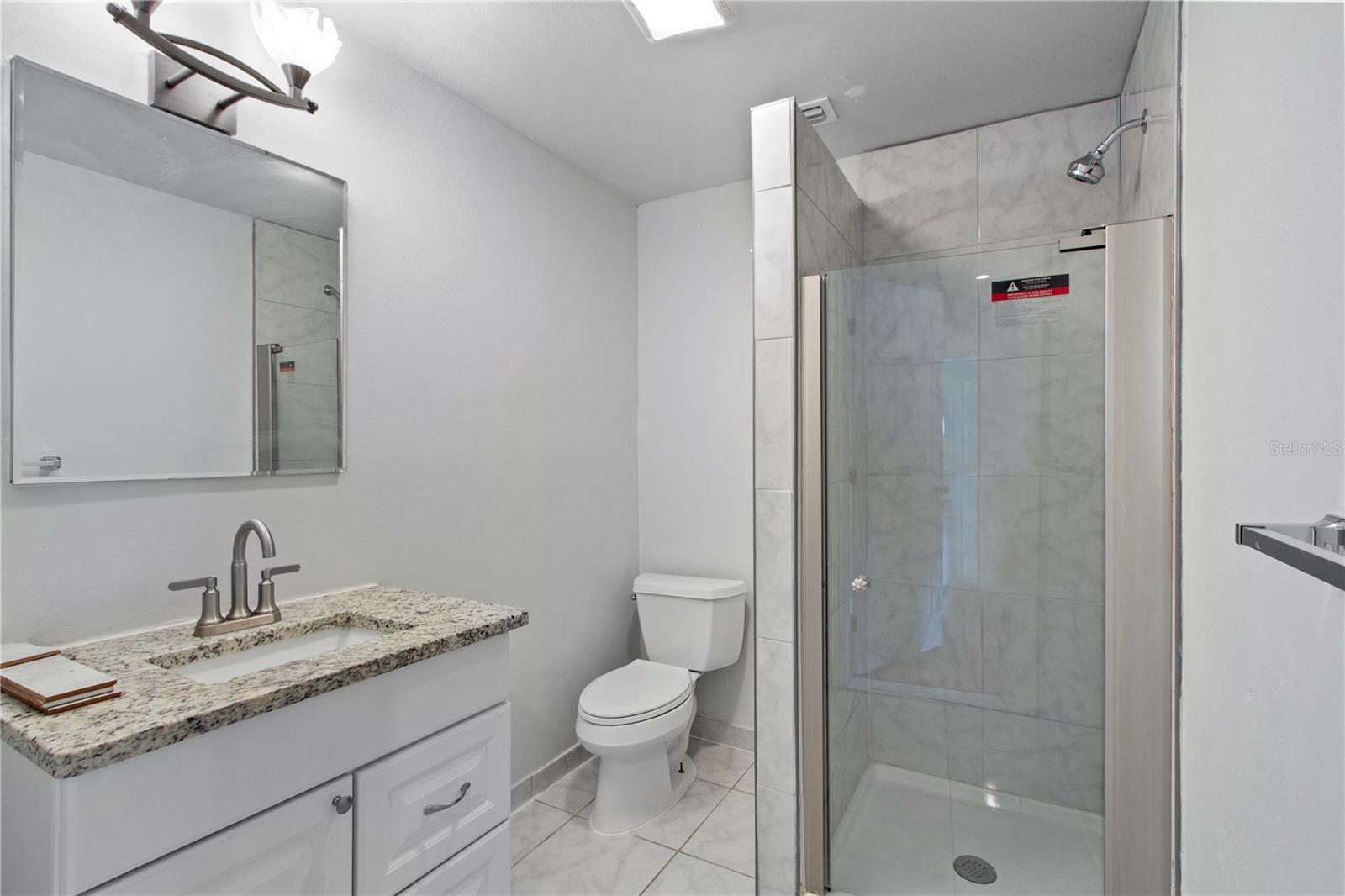8514 N MITCHELL AVE — photo 9