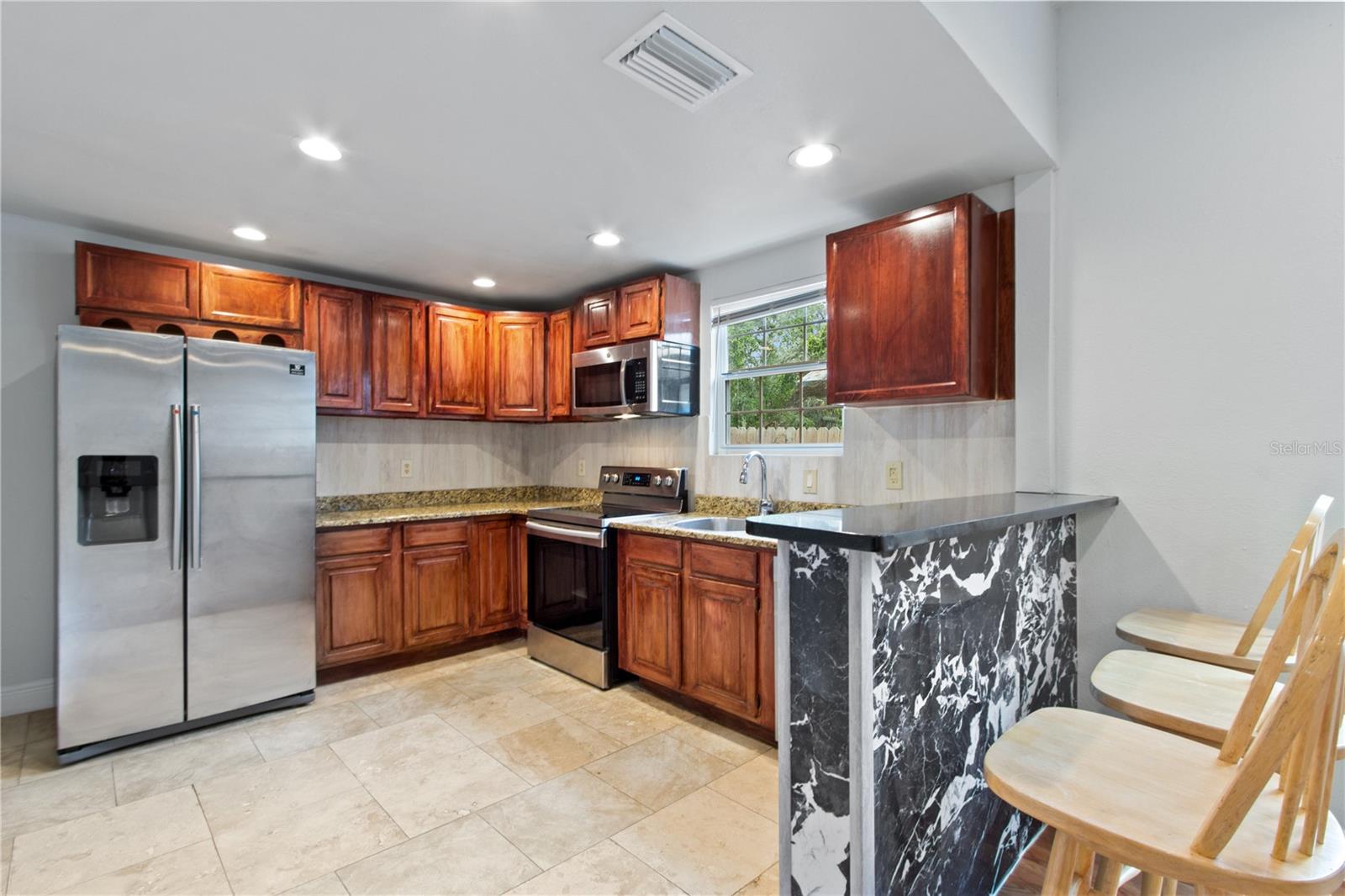 8514 N MITCHELL AVE — photo 5