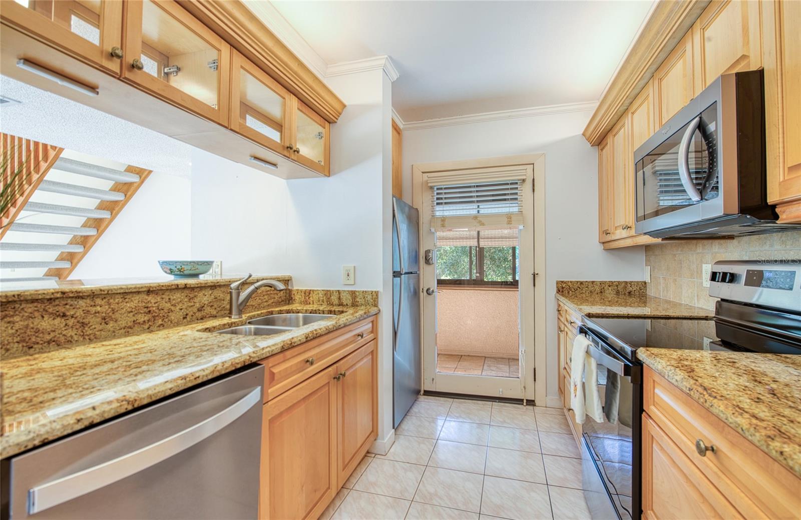 6305 PELICAN CREEK XING #D — photo 54