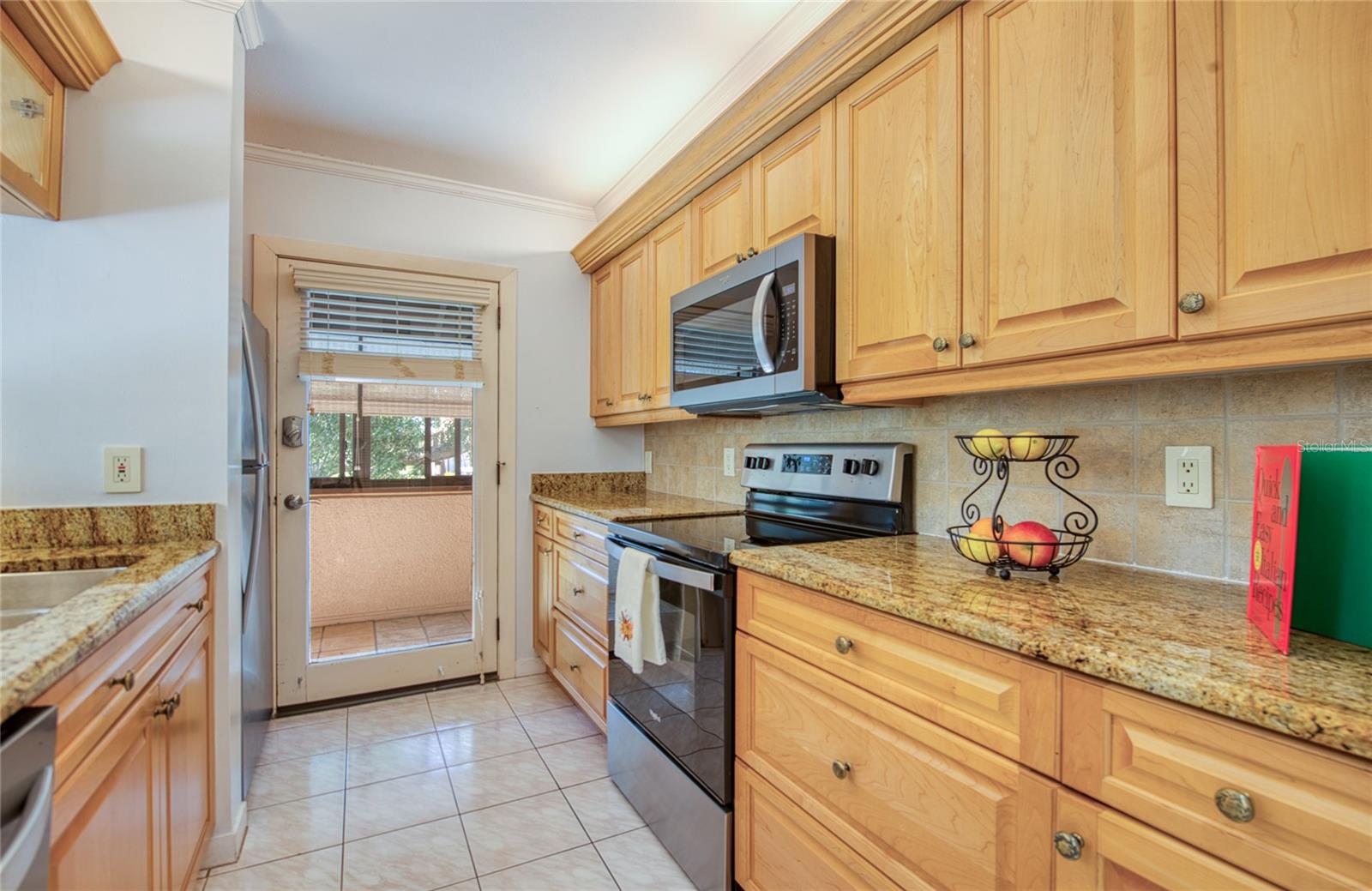 6305 PELICAN CREEK XING #D — photo 5